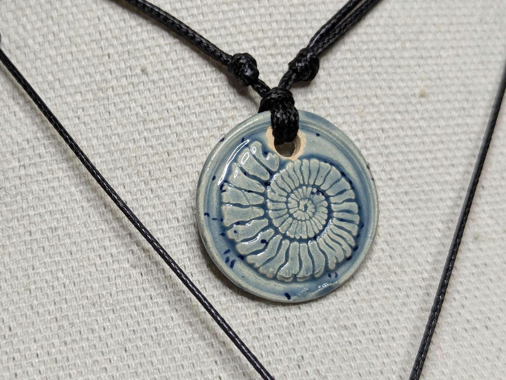 NoctemPottery Handmade Ceramic Ammonite Pendant Faux Wax Seal Necklace Black Cord