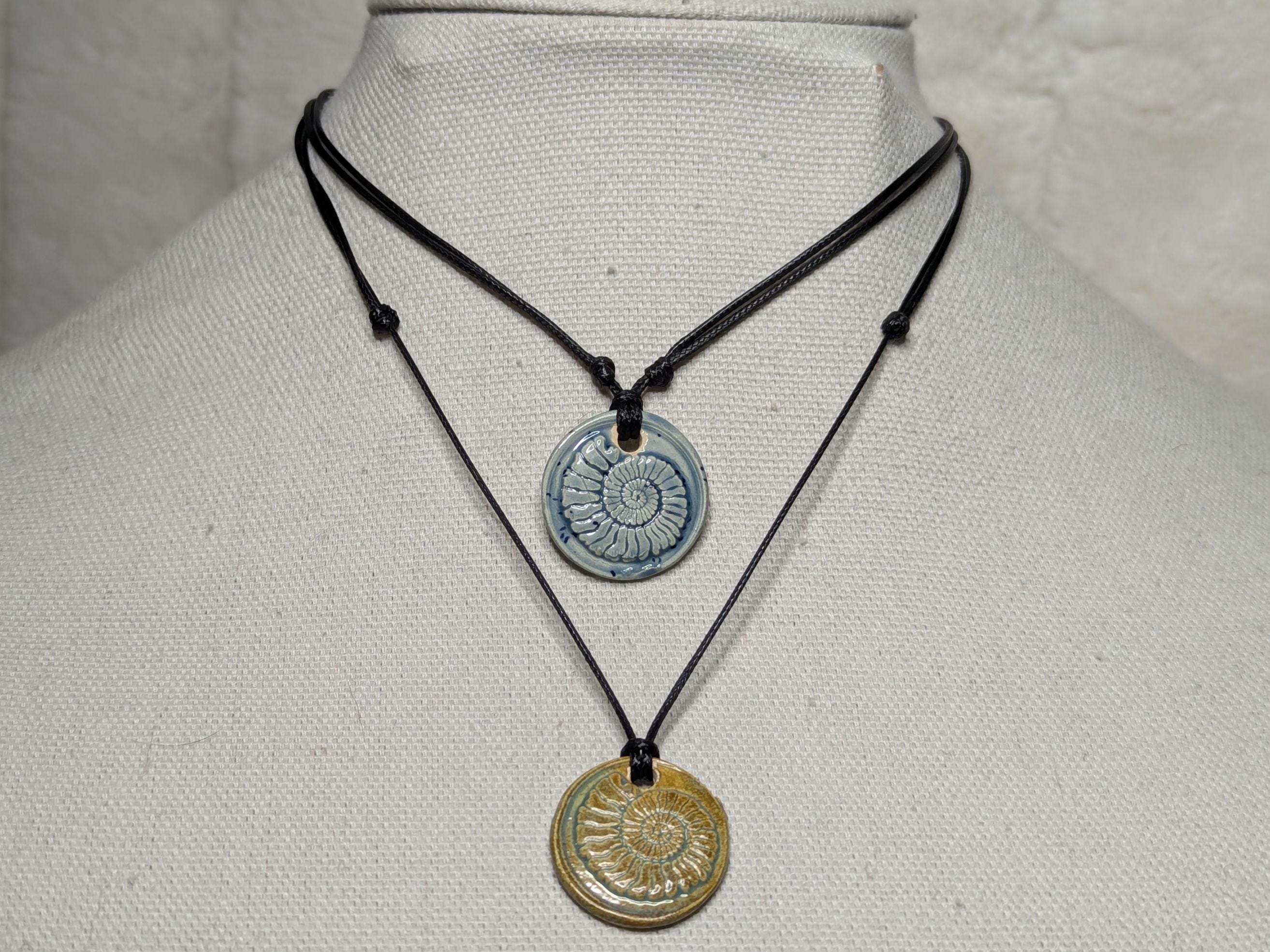 NoctemPottery Handmade Ceramic Ammonite Pendant Faux Wax Seal Necklace Black Cord