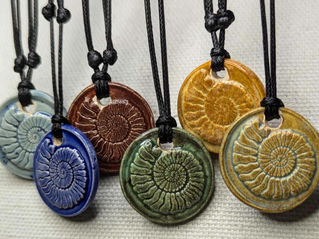 NoctemPottery Handmade Ceramic Ammonite Pendant Faux Wax Seal Necklace Black Cord