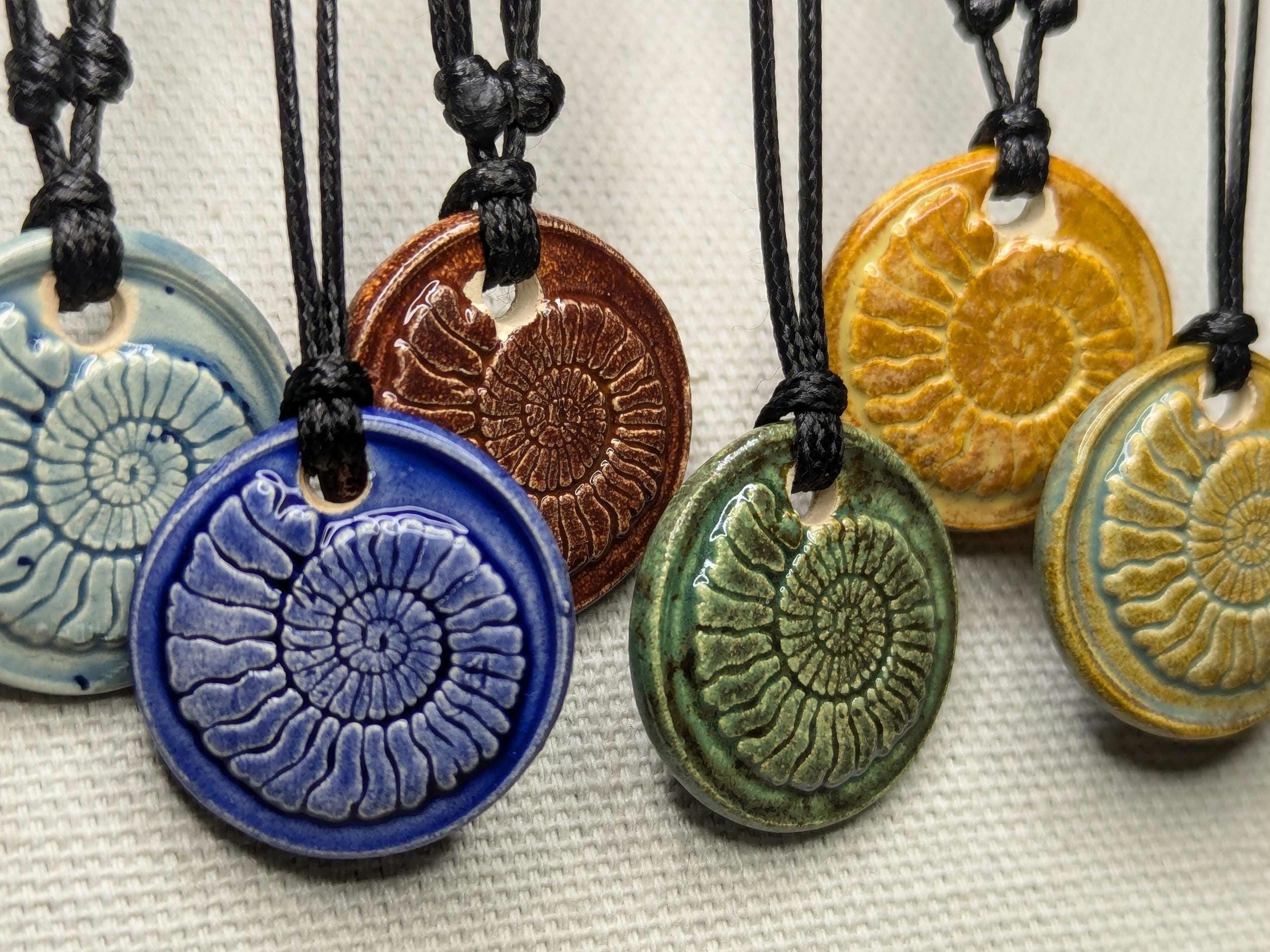 NoctemPottery Handmade Ceramic Ammonite Pendant Faux Wax Seal Necklace Black Cord