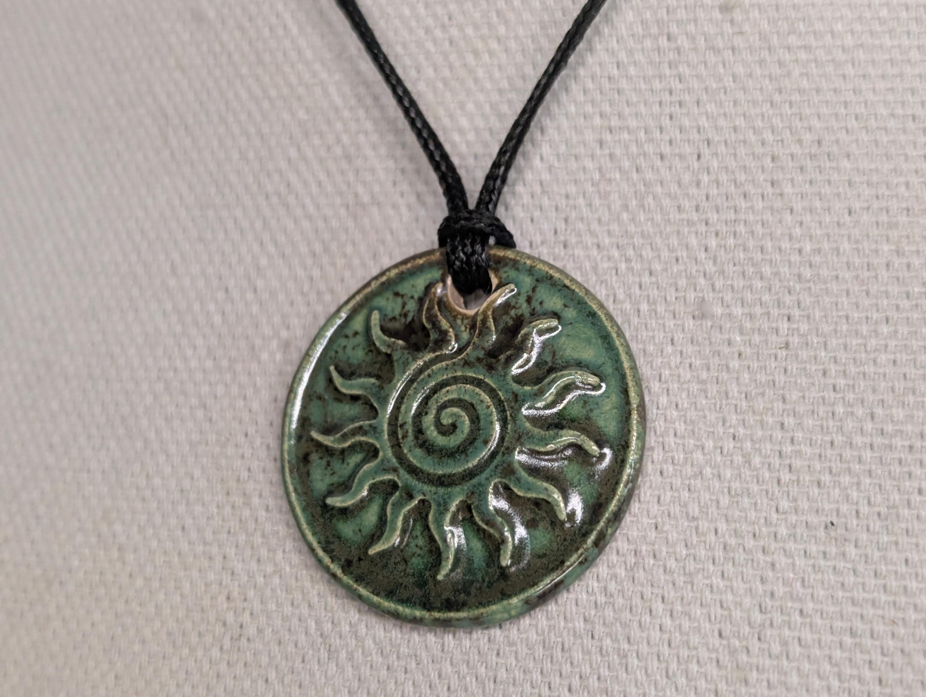 NoctemPottery Swirl Sun Ceramic Wax Seal Pendant Adjustable Cord Necklace