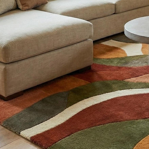 Abstract Wavy Oval Hand Tufted Wool Rug Sage Green Terracotta